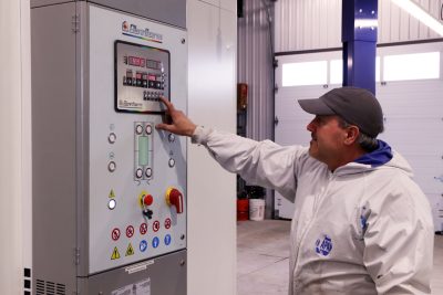 Operating the paint booth controls at the autobody shop location for Bridgeview Motors in St. Thomas Ontario.
