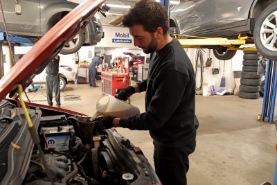 Vehicle mechanic service work in action at Bridgeview Motors in St. Thomas Ontario.