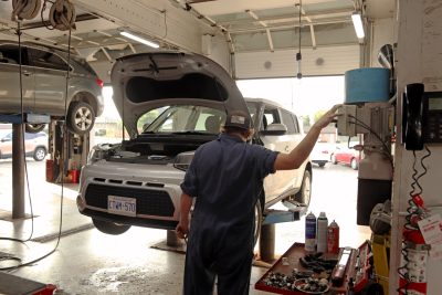 Vehicle mechanic service work in action at Bridgeview Motors in St. Thomas Ontario.