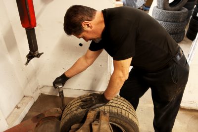 Vehicle tire service work in action at Bridgeview Motors in St. Thomas Ontario.