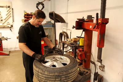Vehicle tire service work in action at Bridgeview Motors in St. Thomas Ontario.