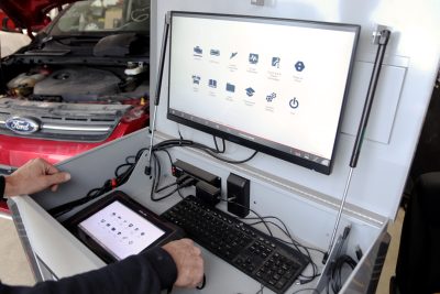 Vehicle diagnostic service work in action at Bridgeview Motors in St. Thomas Ontario.